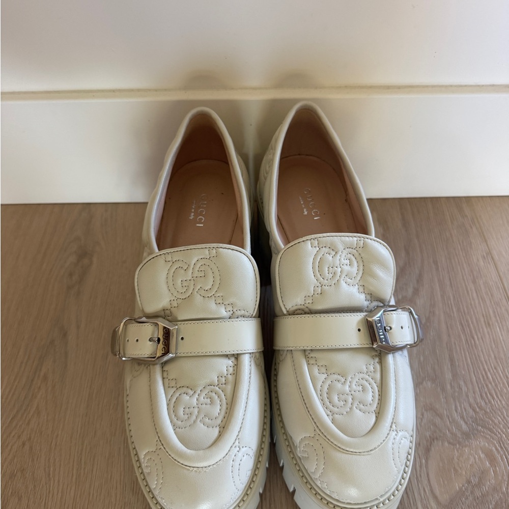 Gucci Women's Off-White Loafers with Silver Buckle